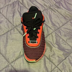 Vibrant Athletic Sneaker with Red and Black Accents